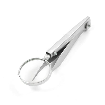 Forceps with magnifying glass